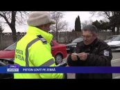 Pieton lovit pe zebră