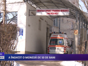 A înghițit o monedă de 50 de bani
