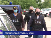 Polițiști reținuți pentru 24 de ore